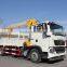 howo 6*4 25T crane truck gets up with the heavy and transport vehicle truck with loading crane