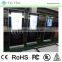 Freestanding digital signage player with mobile phone charge