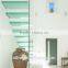Contemporary floating staircase with open glass treads