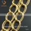 gold color double chain with straight line surface