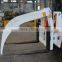 Forklift Attachment With Hinged Broke Handler and Material Handling Clamp
