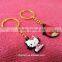 Cute logo silicone/pvc keychain with gold metal link