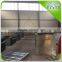 Greenhouse rack and pinion system