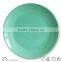 green colorful stoneware round salad plate