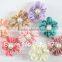 Decorative lovely wholesale cheap pearl center chiffon flower for girl's clothes