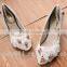 The little white bridesmaid shoes with a low heel and a high heel for the bride's shoes WS028