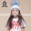 Superior Stable With Braids Fur Ball Beanie Hat