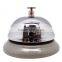 reception bell on table in silver or gold cover and colorful painted base with logo