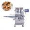 Encrusting machine for confectionery