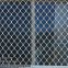 Heavy gauge decorative aluminum amplimesh grille for airport protection