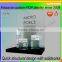 Acrylic counter essential oil display rack in cosmetcs stores
