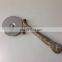 brass antique pizza cutter