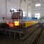 Pusher type quenching and tempering furnace