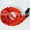 orange flexible elastic garden hose with free water gun