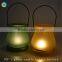 Hanging candle containers with scented candles