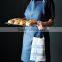 Custom blue cotton canvas kitchen cooking apron with cross-back straps