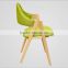 green color fabric indoor wood chair