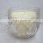 candle in glass jar