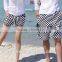 Hot sale custom printing couple beach shorts made in china