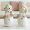 small resin snowman figurine in Christmas girl design