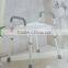 Aluminum shower chair with padded armrest