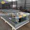 7LSJG Shandong SevenLift 2000kg customized hydraulic large orange red double scissor warehouse cargo elevator lift table