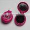 Folding hairbrush with mirror