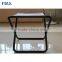 small black folding luggage rack for guest room