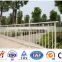 White wrought iron wire fencing