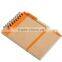 Spiral binding brown paper notebook with pen