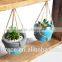 Wooden frame swings concrete planters