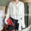 Woman fashion long bell sleeve white color bow front loose chiffon blouse