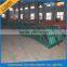 Adjustable container loading and unloading ramp