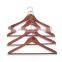 Wholesale natural red wood cedar clothes hanger with fixed bar