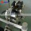 Labeling machine for amber glass bottles, plastics and other materials