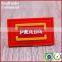 Custom red silicone pvc tags labels for shirt suitcase shoes