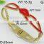 Special design gold and red color stainless steel knot open bangle