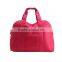 Red color china cheap duffle bag luggage