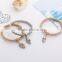 New fashion bangle for women punk style skeleton pendant jewelry cheap gold bracelet