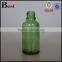 hot selling wholesale 30ml light green empty hair oil glass bottle pump cosmetics screen printing hot stamping free sample