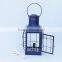 Iron Chief's Oil Lamp Blue beach-style-outdoor-table- 1840