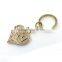 Fashion round hard shape gold metal alloy keychain charm for handbag