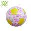 Happy kid play toy of rolling ball with flower pattern for girl and boy