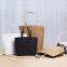 Yellow kraft paper shopping bag with string