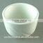 white porcelain cup with embossed wave design