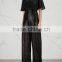 Wholesale Women Apparel Ruffled Sleeves Open Back Black Sequinned Tulle Jumpsuit(DQE0115J)