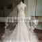 Style ZS-a0050 Trumpet strapless organza faced bodice tulle wedding dress with floral detail