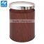 Mahogany color waste bin hotel room