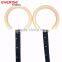 Wooden gymnastic rings with gym wrist straps and adjustable strap buckle for crossfit