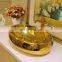 Gold color oval shape ceramic porcelain bathroom wash basin sink